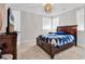 This bedroom offers a cozy atmosphere with carpeted floors and a beautifully crafted wooden bed frame at 194 Avenue Of The Palms, Myrtle Beach, SC 29579