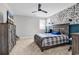 This bedroom features a stylish decor, with a dark ceiling fan and unique accent walls adding personality at 194 Avenue Of The Palms, Myrtle Beach, SC 29579