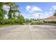 The community provides a scenic view leading to a serene lake, enhanced by manicured landscaping and lush greenery at 194 Avenue Of The Palms, Myrtle Beach, SC 29579