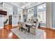 Elegant dining room with coffered ceilings, chandelier, and large windows, perfect for entertaining guests at 194 Avenue Of The Palms, Myrtle Beach, SC 29579