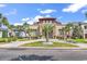 Stunning home featuring stone accents, manicured landscaping, circular driveway, and a well-maintained lawn at 194 Avenue Of The Palms, Myrtle Beach, SC 29579