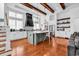 Bright kitchen with island, stainless steel appliances, and hardwood flooring at 194 Avenue Of The Palms, Myrtle Beach, SC 29579
