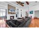 Open-concept living room with beamed ceilings, fireplace, and cozy seating at 194 Avenue Of The Palms, Myrtle Beach, SC 29579