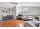 A living room with hardwood floors and a ceiling fan at 194 Avenue Of The Palms, Myrtle Beach, SC 29579