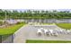 Outdoor patio featuring multiple white lounge chairs perfect for relaxation and enjoying the waterfront views at 194 Avenue Of The Palms, Myrtle Beach, SC 29579