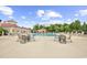 A community pool featuring ample seating and a well-maintained pool area, perfect for relaxation and recreation at 194 Avenue Of The Palms, Myrtle Beach, SC 29579