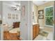 Bathroom featuring a wood vanity, modern fixtures, and a beautiful view adjacent to the Bedroom at 199 Gilman Rd., Pawleys Island, SC 29585