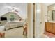 Bedroom and bathroom area with neutral colors and a window allowing natural light at 199 Gilman Rd., Pawleys Island, SC 29585