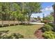 Lush front yard with mature trees, shrubs and sidewalk. Perfect for enjoying the outdoors at 199 Gilman Rd., Pawleys Island, SC 29585