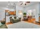 Inviting living area with hardwood floors and views of the breakfast bar, kitchen, and entryway at 199 Gilman Rd., Pawleys Island, SC 29585