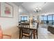 Cozy dining area with glass-topped table and views of the ocean at 201 S Ocean Blvd., North Myrtle Beach, SC 29582