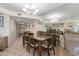 Spacious dining area with seating for six and easy access to living room and kitchen at 201 S Ocean Blvd., North Myrtle Beach, SC 29582