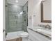 Bathroom featuring tiled walk-in shower with glass door and granite-topped vanity at 226 9Th Ave. S, North Myrtle Beach, SC 29582