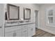 Bathroom with dual vanity, marble countertop, and modern fixtures at 226 9Th Ave. S, North Myrtle Beach, SC 29582