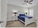 Bright bedroom with a ceiling fan, shutters on windows and white furniture at 226 9Th Ave. S, North Myrtle Beach, SC 29582