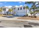 Charming two-story home features a garage, covered porch, and beautiful landscaping at 226 9Th Ave. S, North Myrtle Beach, SC 29582