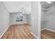 Bedroom features a ceiling fan, vaulted ceilings, wood-look flooring, and a large window at 229 Duchess Ct., Myrtle Beach, SC 29588