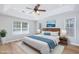 Serene main bedroom featuring a tray ceiling, carpet, and bedside lamps at 229 Duchess Ct., Myrtle Beach, SC 29588