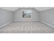 Large bedroom has neutral carpet and trim and a large window at 229 Duchess Ct., Myrtle Beach, SC 29588