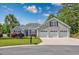 Charming single Gathering home with three-car garage, well-manicured lawn, and inviting curb appeal at 229 Duchess Ct., Myrtle Beach, SC 29588
