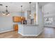 Spacious kitchen with pendant lights, stainless steel appliances, and breakfast bar at 229 Duchess Ct., Myrtle Beach, SC 29588