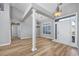 Open-concept living area featuring wood-look floors and modern lighting at 229 Duchess Ct., Myrtle Beach, SC 29588