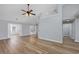 Spacious living room featuring light gray walls and open layout with wood floors at 229 Duchess Ct., Myrtle Beach, SC 29588