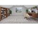 This office space features a large window, shelving, desk, and neutral carpet at 229 Duchess Ct., Myrtle Beach, SC 29588
