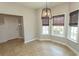 Cozy dining area features tile floors, pendant lighting, and large bay windows at 232 Palm Cove Circle, Myrtle Beach, SC 29588