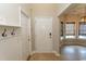 Bright foyer with coat rack and tile floors, adjacent to dining area at 232 Palm Cove Circle, Myrtle Beach, SC 29588