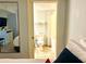 Cozy bathroom view from bedroom highlighting a toilet and bathtub shower for a complete and functional space at 2404 N Ocean Blvd. # 635, Myrtle Beach, SC 29577