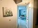 The hallway features a view into the living room, which has modern decorations and tile floors at 2404 N Ocean Blvd. # 635, Myrtle Beach, SC 29577