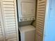 Convenient stacked washer and dryer unit, enclosed with white bi-fold doors, for efficient laundry solutions at 2404 N Ocean Blvd. # 635, Myrtle Beach, SC 29577