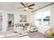 Cozy bonus room with comfortable seating, natural light, and stylish decor at 246 Mayflower Dr., Calabash, NC 28467