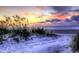 Coastal image of beach with sand dune and sea grass at sunset at 261 Mayflower Dr., Calabash, NC 28467