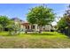 Spacious backyard featuring a wooden pergola, lawn, landscaping, and outdoor seating area at 274 Avenue Of The Palms, Myrtle Beach, SC 29579