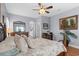 Relaxing bedroom boasts hardwood floors and soft blue walls at 274 Avenue Of The Palms, Myrtle Beach, SC 29579