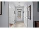 Well-lit foyer with tiled floors, and white doors at 274 Avenue Of The Palms, Myrtle Beach, SC 29579