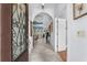 Welcoming foyer with decorative glass front door, arched doorway, and tiled flooring at 274 Avenue Of The Palms, Myrtle Beach, SC 29579