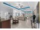 Spacious living room with blue accents, tiled floors, and an open floor plan at 274 Avenue Of The Palms, Myrtle Beach, SC 29579