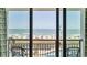 Balcony view overlooking the beach, ocean, and pool at 3000 N Ocean Blvd. # 220, Myrtle Beach, SC 29577