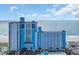Beautiful beachfront condo with blue accents, multiple balconies, and stunning ocean views at 3000 N Ocean Blvd. # 220, Myrtle Beach, SC 29577