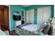 Serene bedroom showcasing coastal-themed décor, storage, and a view into the bathroom at 3358 Pampas Dr., Myrtle Beach, SC 29577