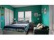 Bright bedroom featuring coastal decor, a comfortable bed, and ample natural light at 3358 Pampas Dr., Myrtle Beach, SC 29577