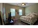 Relaxing bedroom with ample sunlight, a comfortable seating area, and neutral color scheme at 3358 Pampas Dr., Myrtle Beach, SC 29577