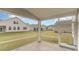 Relax on the screened porch overlooking the spacious backyard and neighboring homes at 341 Glacier Way, Conway, SC 29526