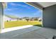 An open view of the community is seen from the covered back porch at 383 Hayloft Circle, Conway, SC 29526