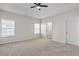 Bedroom with ceiling fan and two windows at 383 Hayloft Circle, Conway, SC 29526