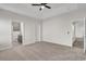 Bedroom with ceiling fan and two doors at 383 Hayloft Circle, Conway, SC 29526