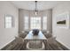 Bright dining room with bay window and marble table at 383 Hayloft Circle, Conway, SC 29526